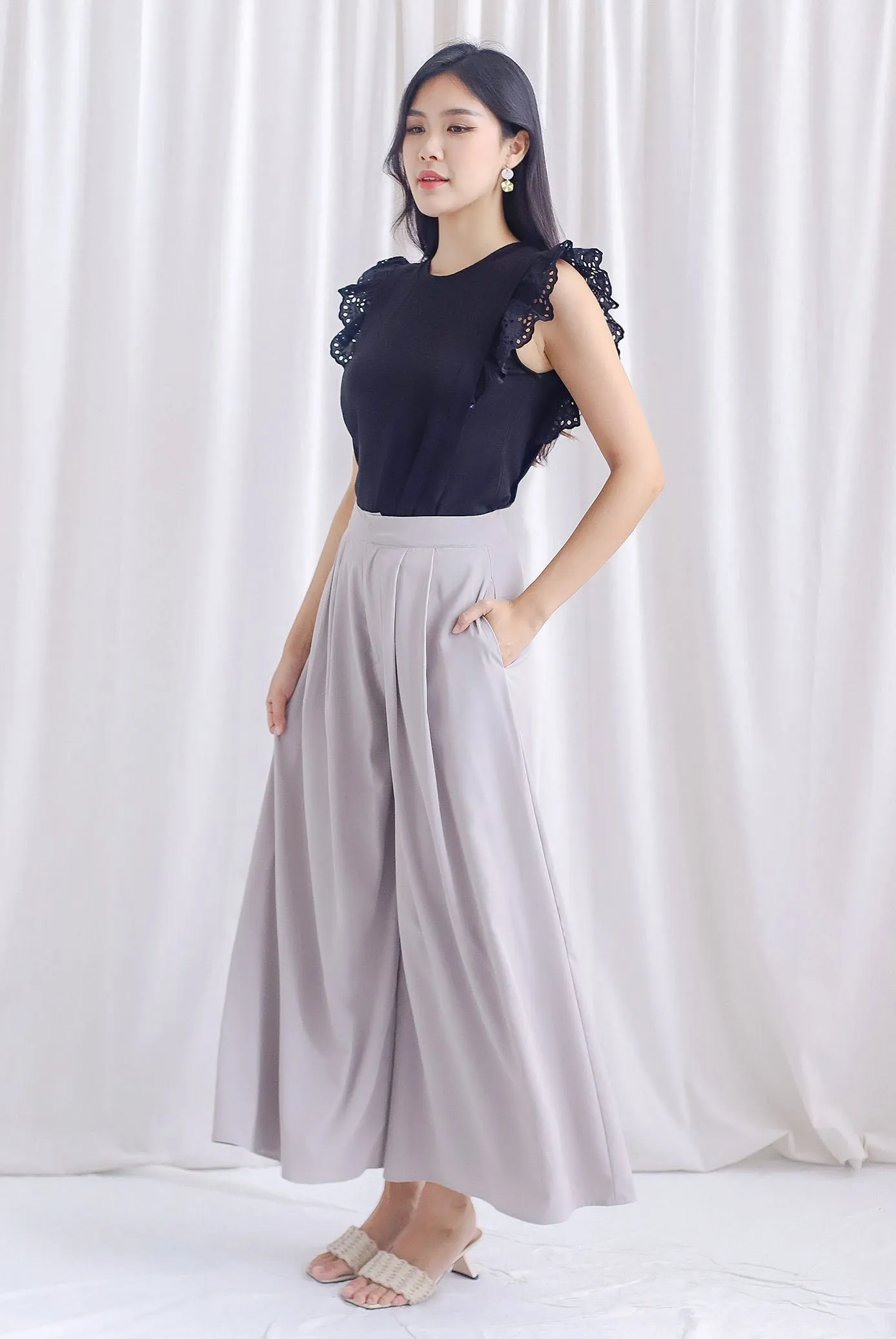 Estelle Eyelet Flutter Sleeve Top In Black