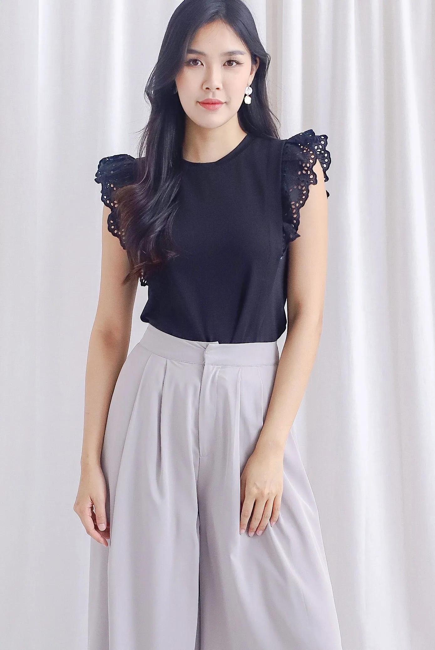 Estelle Eyelet Flutter Sleeve Top In Black