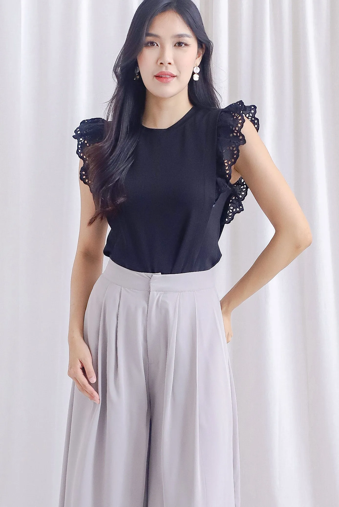 Estelle Eyelet Flutter Sleeve Top In Black