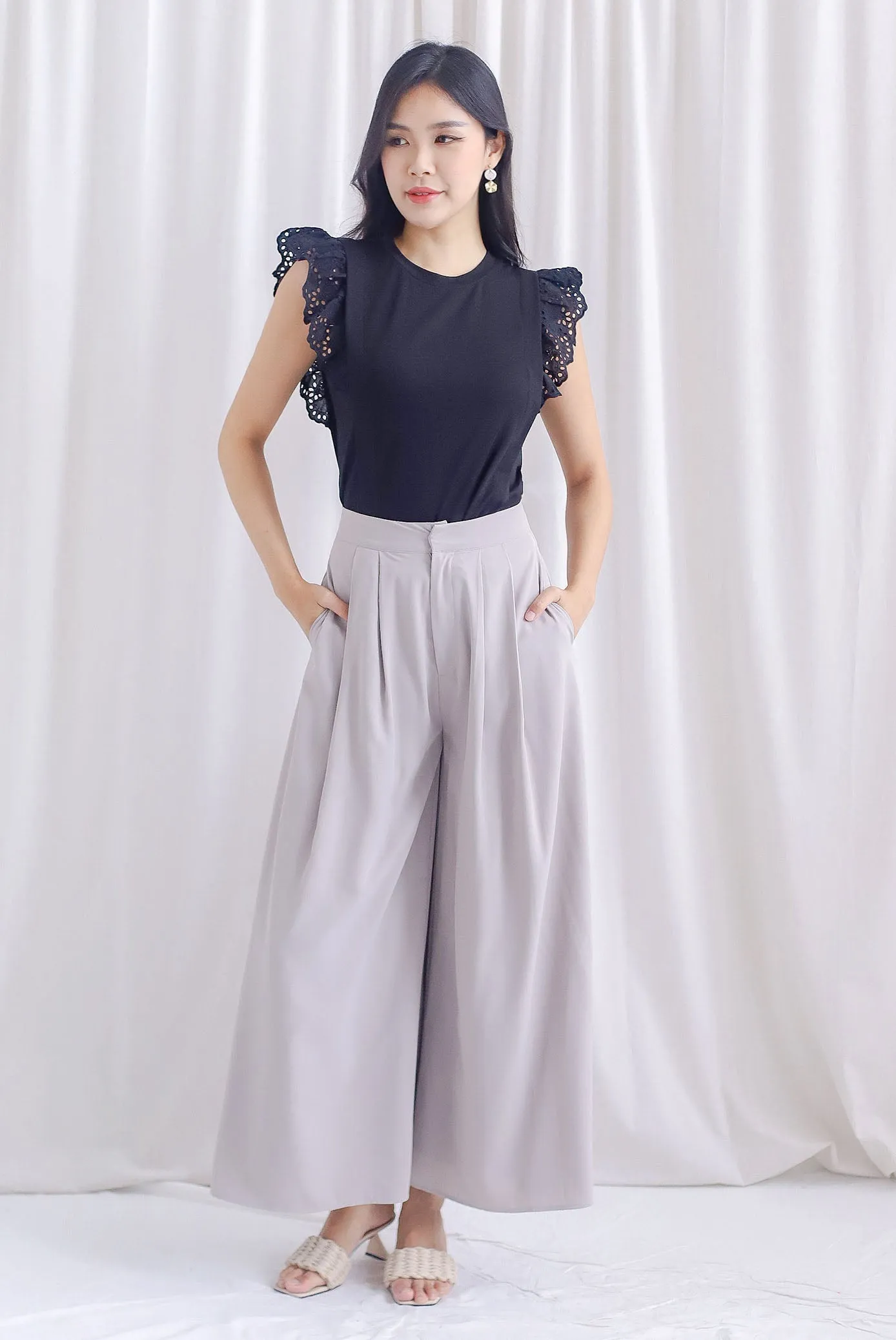Estelle Eyelet Flutter Sleeve Top In Black