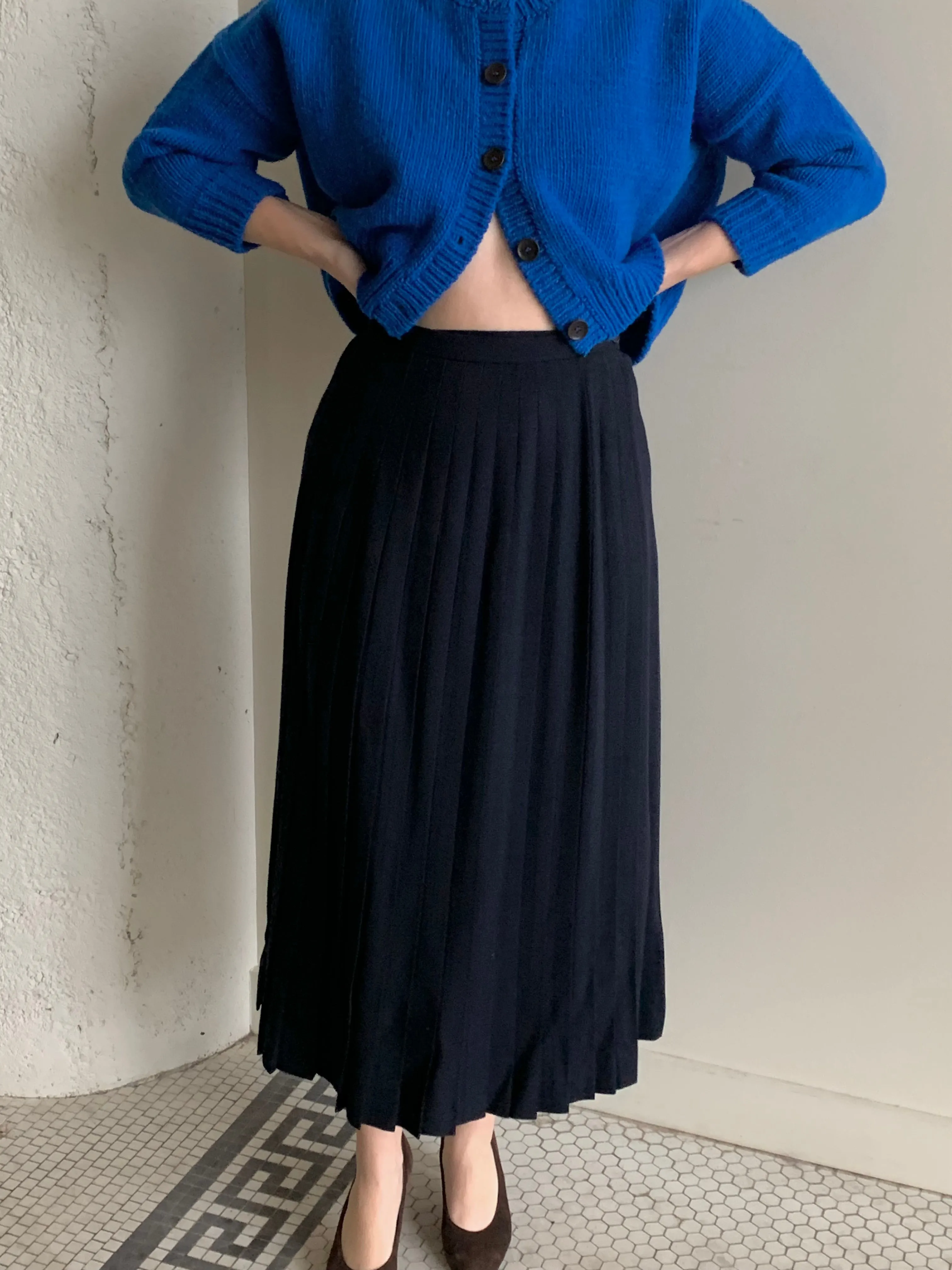 Navy pleated wool midi skirt