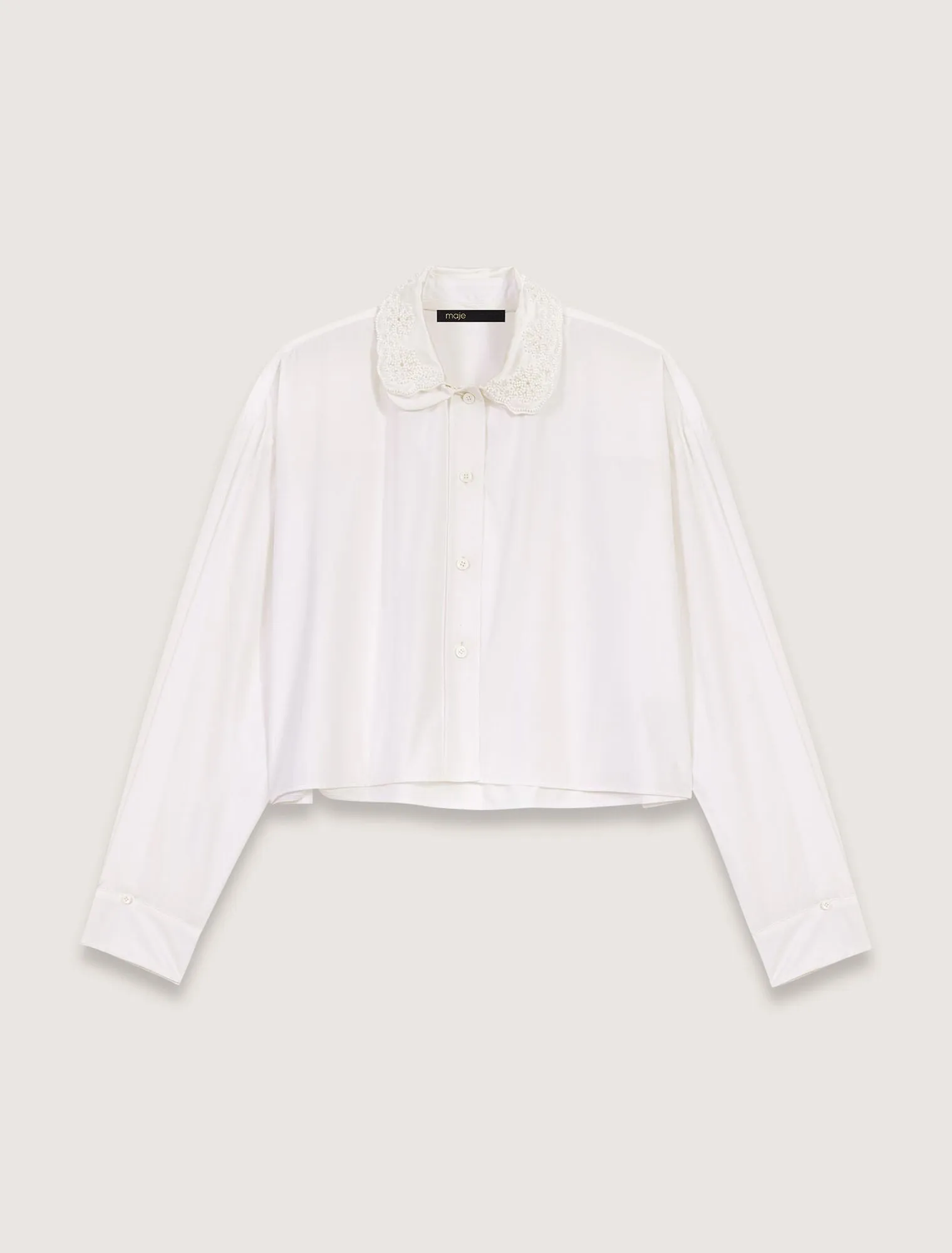 Short shirt with embroidered collar