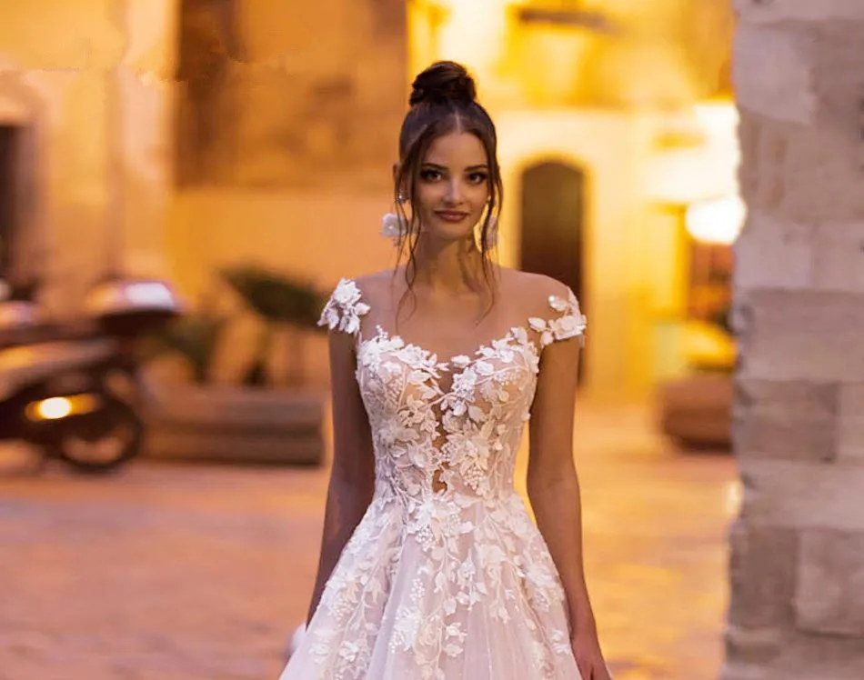 Stunning Backless Wedding Dress With A-line Bodice Cap Sleeves And 3D Appliques Features Tulle And Lace Beading On Plush Skirt