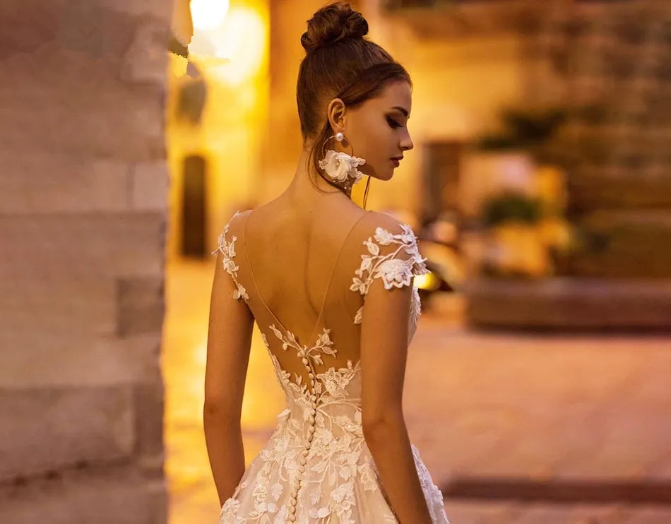 Stunning Backless Wedding Dress With A-line Bodice Cap Sleeves And 3D Appliques Features Tulle And Lace Beading On Plush Skirt