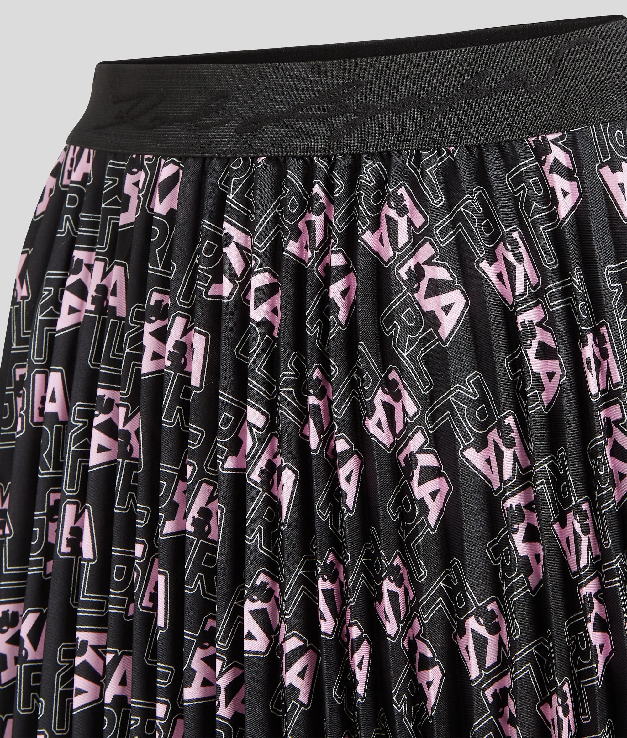 VARSITY AOP PLEATED SHRT SKIRT
